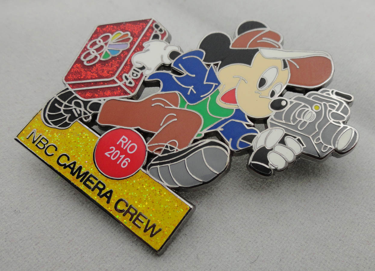 Buy NBC Camera Crew Disney Pin Badge by Zinc Alloy, Synthetic Enamel, Black Nickel, Glitter Filled at wholesale prices