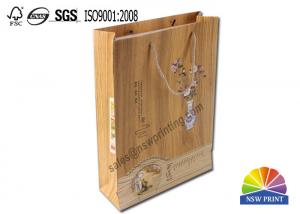 China Promotional Matte Laminated 180GSM Kraft Paper Bags Tea Products Paper Gift Bags on sale