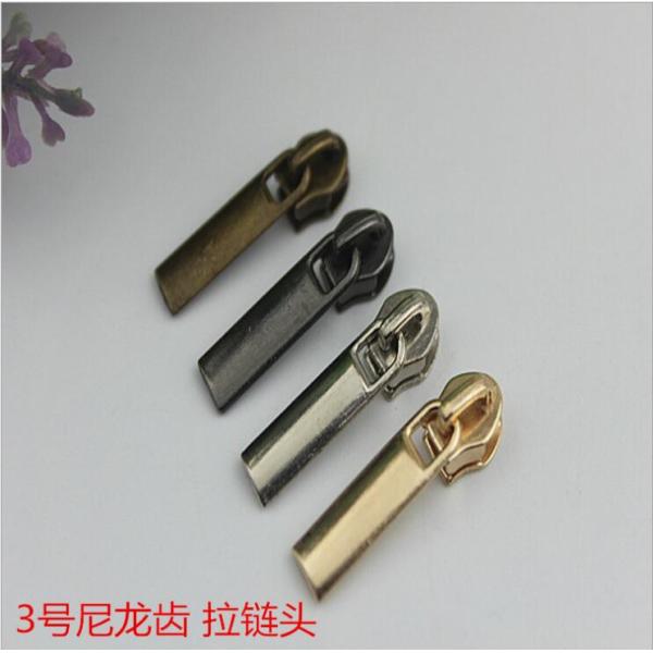Factory direct sale zinc alloy nylon zipper teeth 3# handbag gold zipper puller design