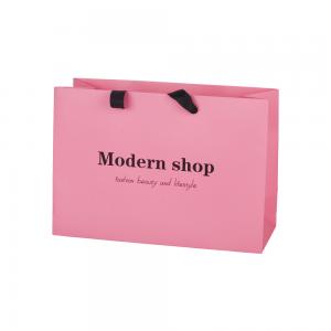 Quality Pink 250g Coated Paper Bags Packaging Clothing With Ribbon Handle for sale